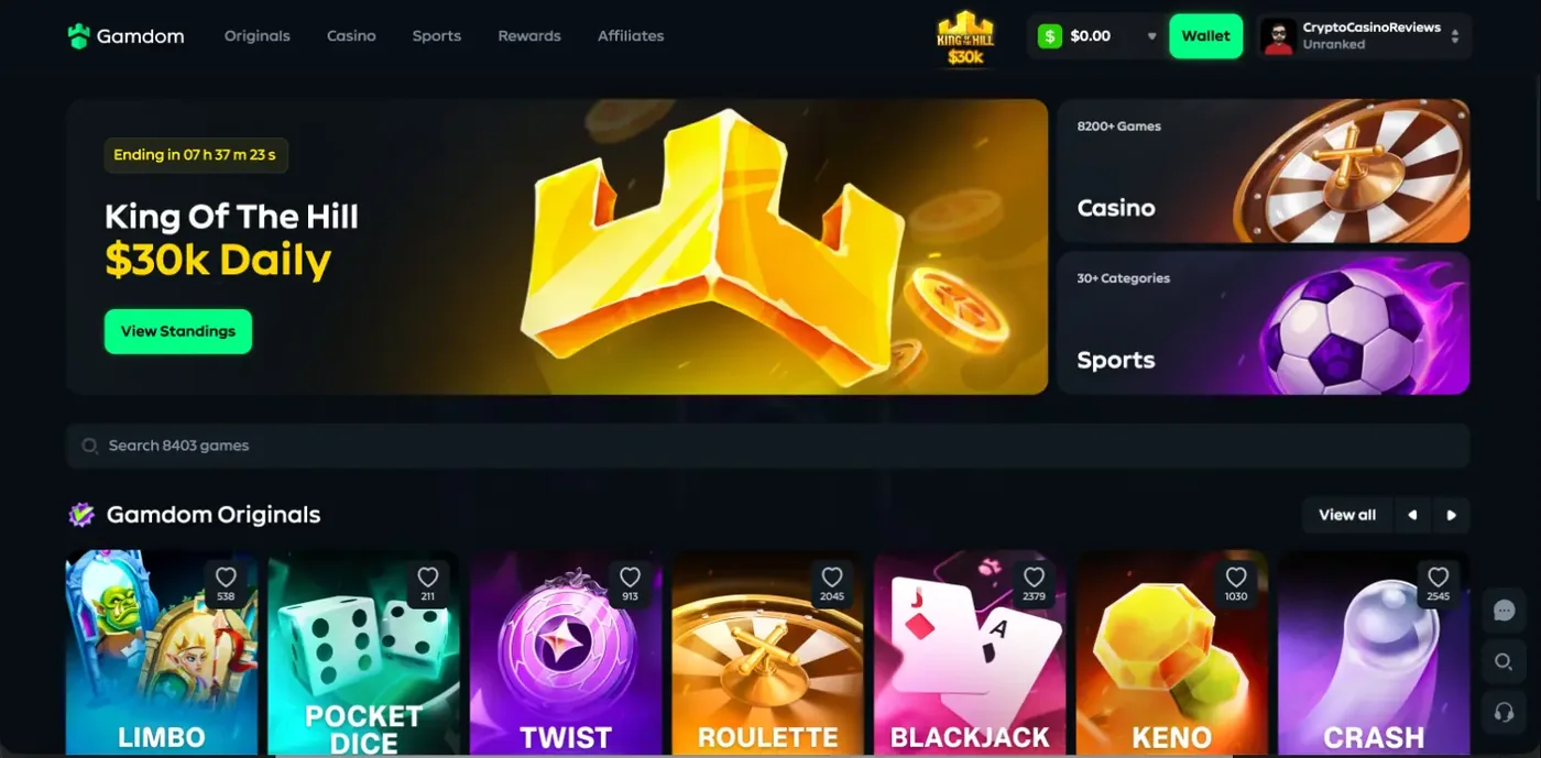 Gamdom lobby with the King Of The Hill 30k daily race, the casino and sports tiles and the Gamdom Originals row